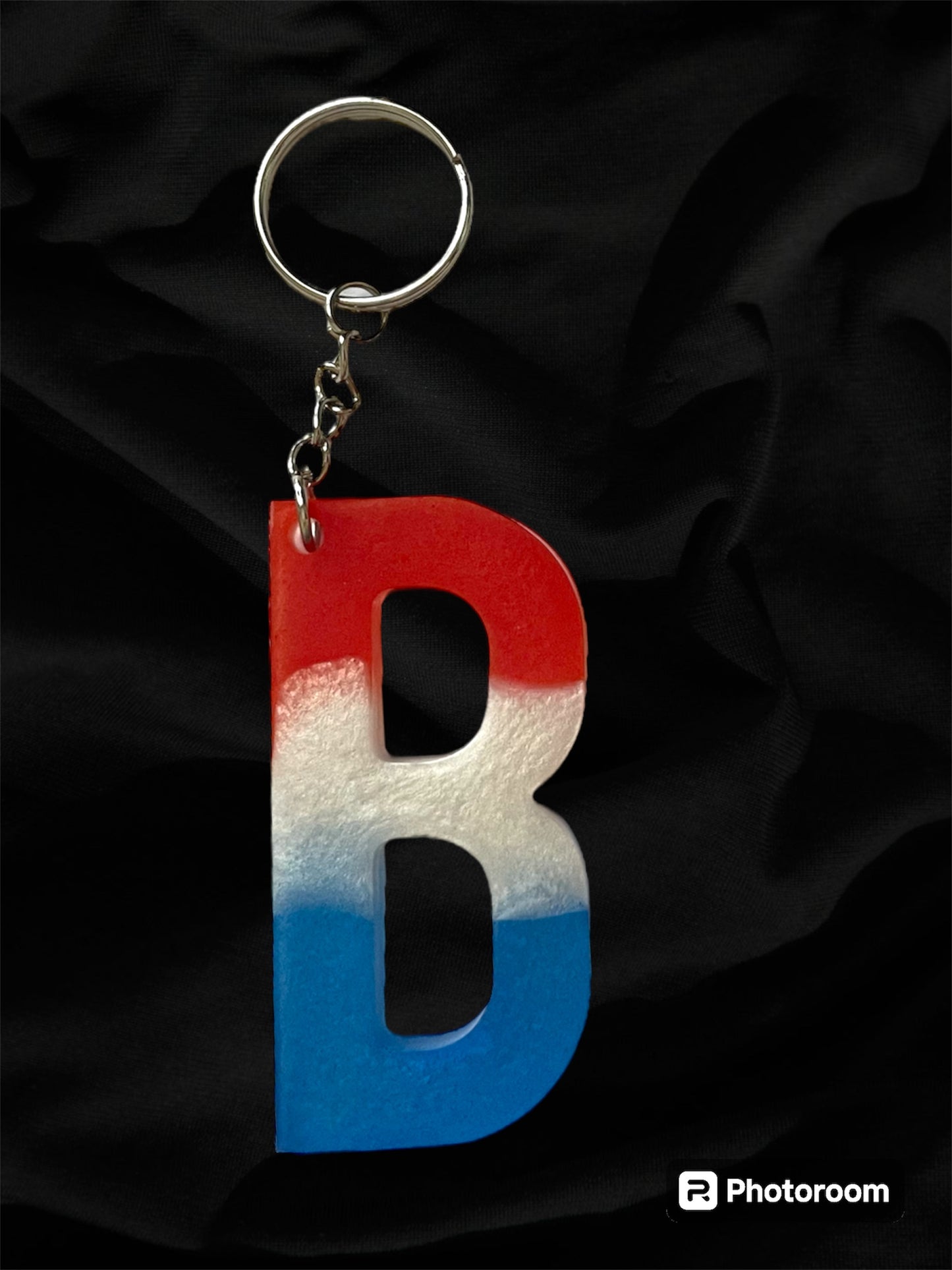 Resin / Epoxy Keychain Letter  - Hand poured and uniquely made. Size 2 1/2" x 1 1/2” Red, White & Blue Patriotic