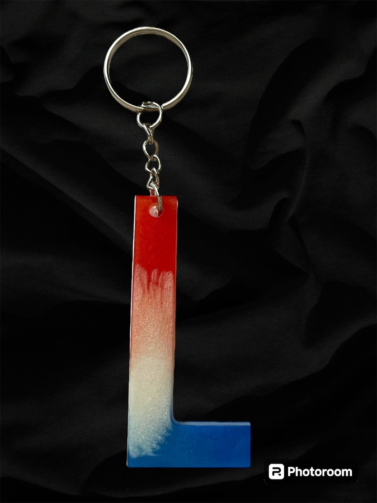 Resin / Epoxy Keychain Letter  - Hand poured and uniquely made. Size 2 1/2" x 1 1/2” Red, White & Blue Patriotic