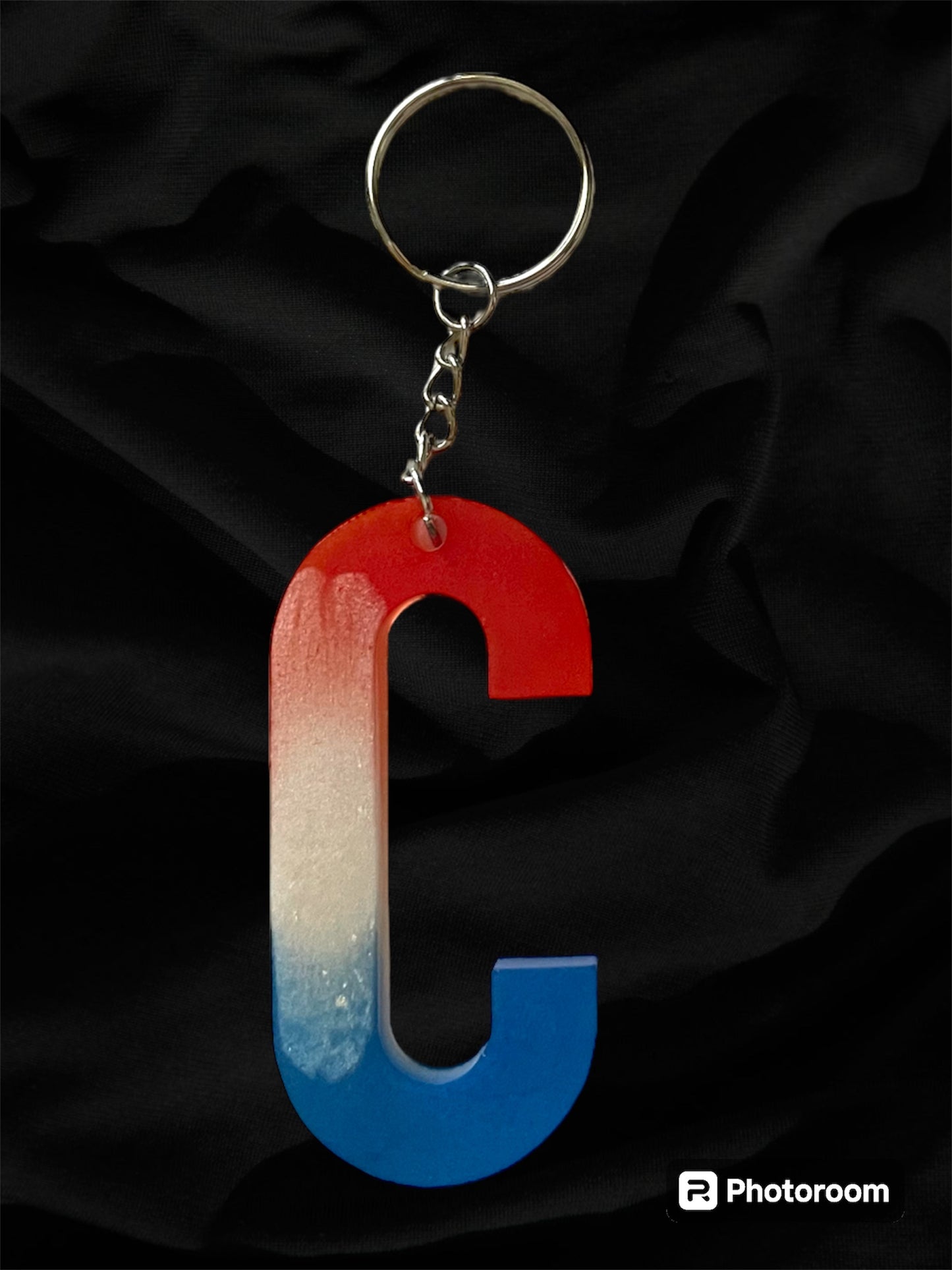 Resin / Epoxy Keychain Letter  - Hand poured and uniquely made. Size 2 1/2" x 1 1/2” Red, White & Blue Patriotic