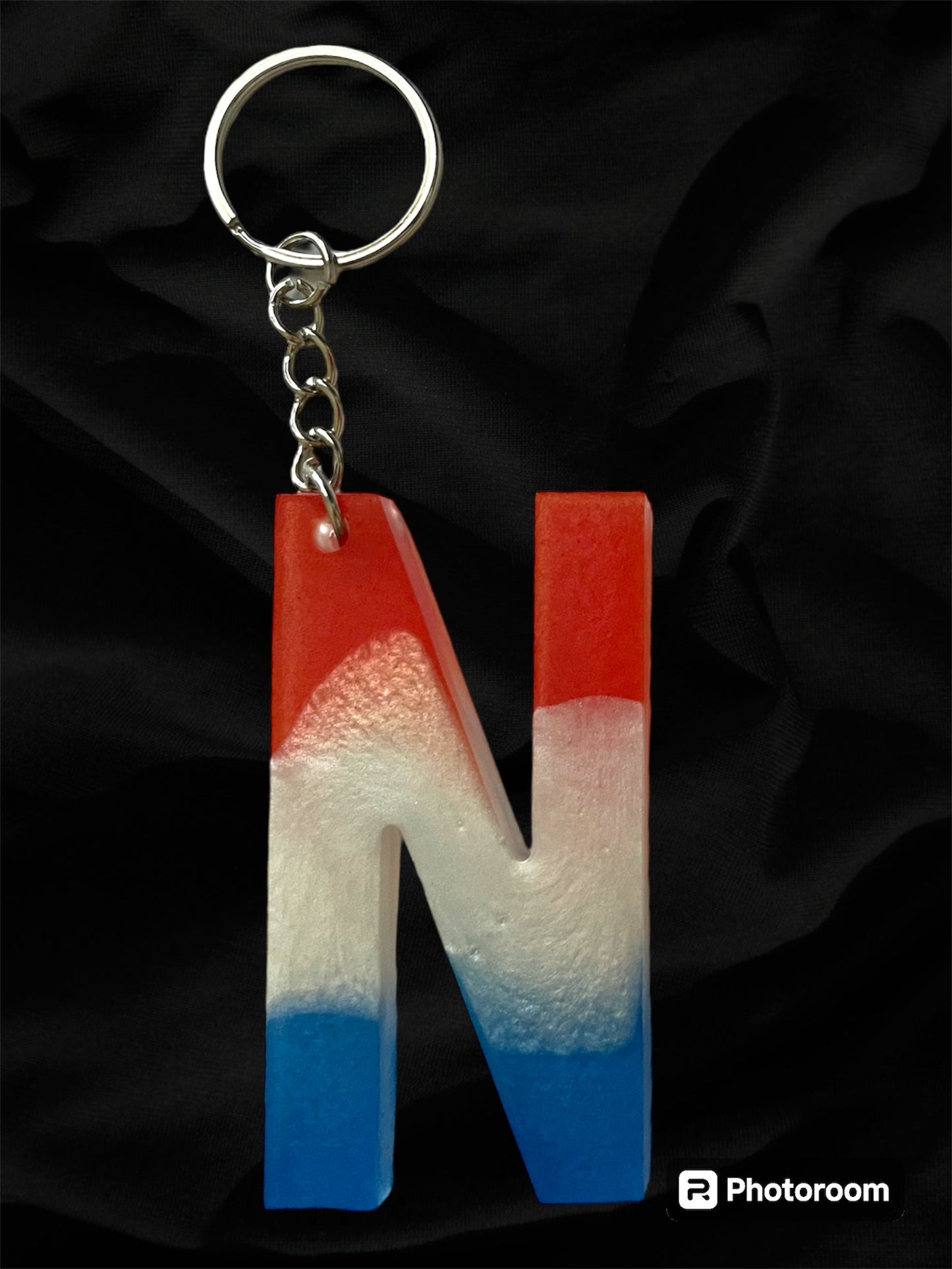 Resin / Epoxy Keychain Letter  - Hand poured and uniquely made. Size 2 1/2" x 1 1/2” Red, White & Blue Patriotic