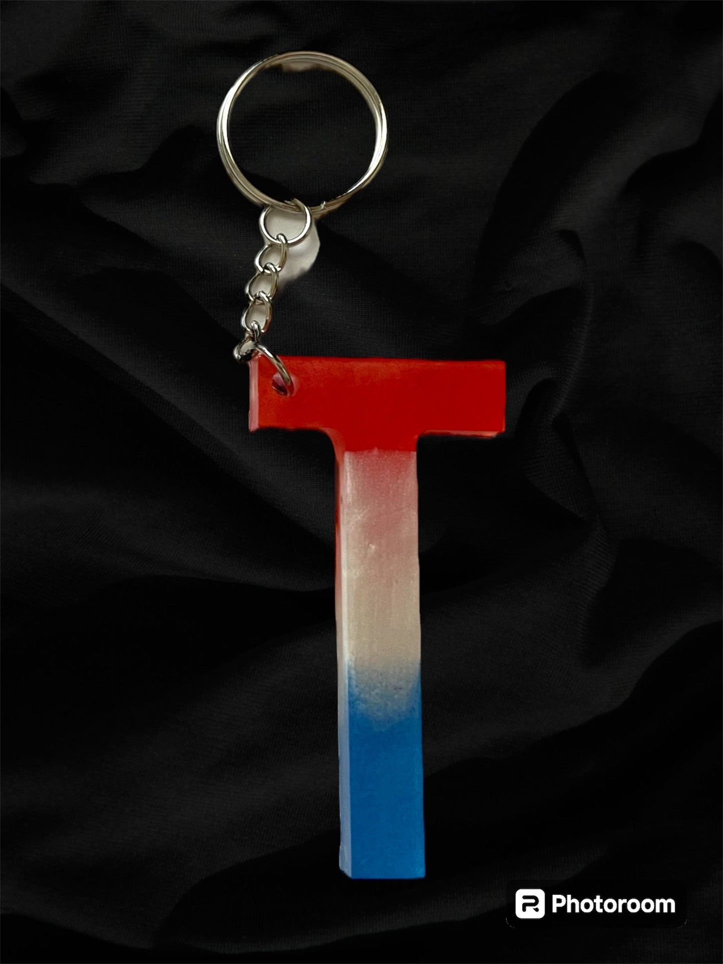 Resin / Epoxy Keychain Letter  - Hand poured and uniquely made. Size 2 1/2" x 1 1/2” Red, White & Blue Patriotic