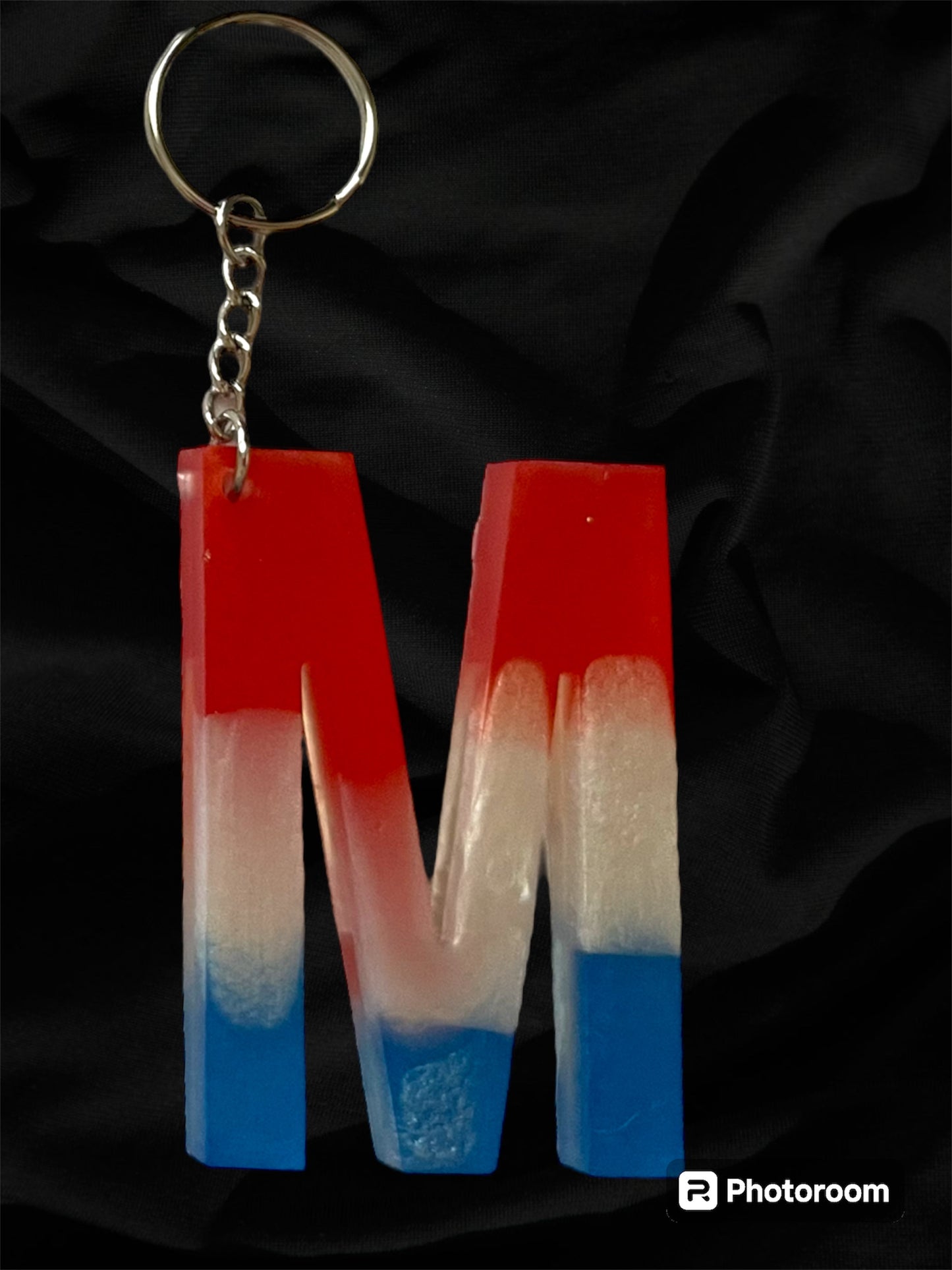 Resin / Epoxy Keychain Letter  - Hand poured and uniquely made. Size 2 1/2" x 1 1/2” Red, White & Blue Patriotic