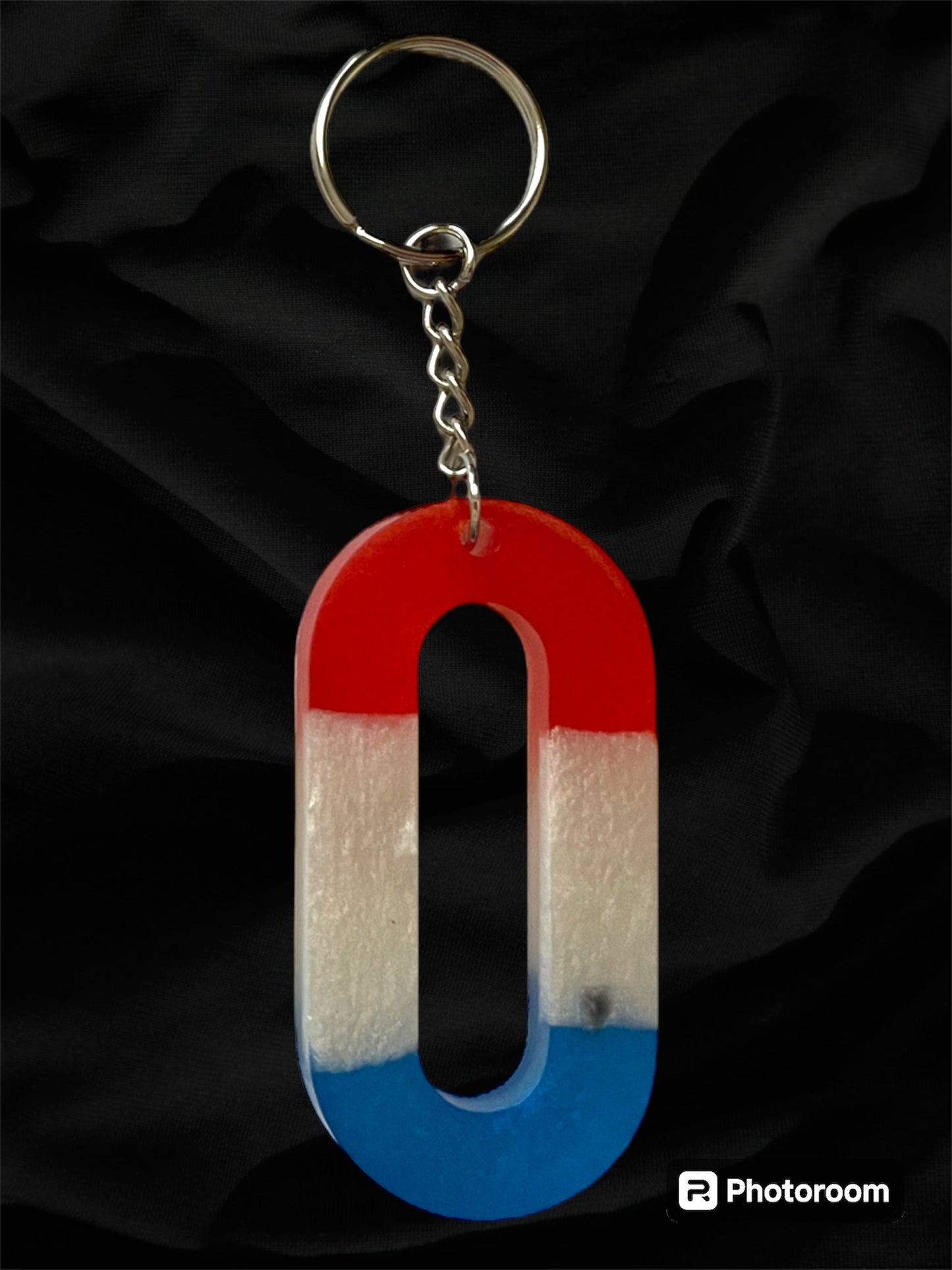 Resin / Epoxy Keychain Letter  - Hand poured and uniquely made. Size 2 1/2" x 1 1/2” Red, White & Blue Patriotic