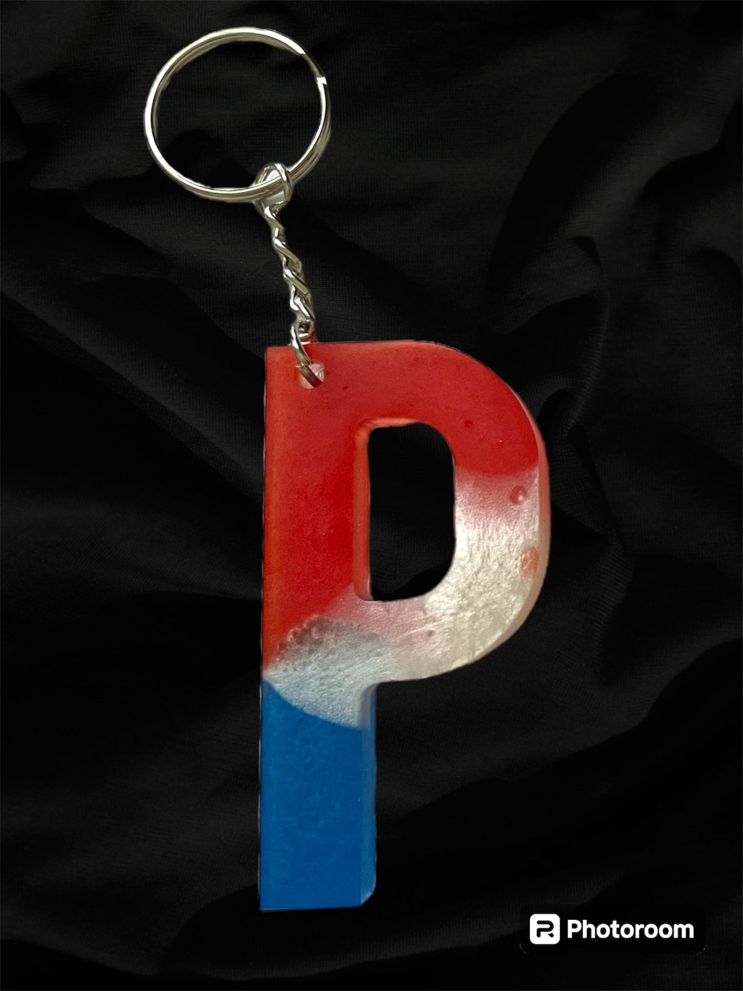 Resin / Epoxy Keychain Letter  - Hand poured and uniquely made. Size 2 1/2" x 1 1/2” Red, White & Blue Patriotic