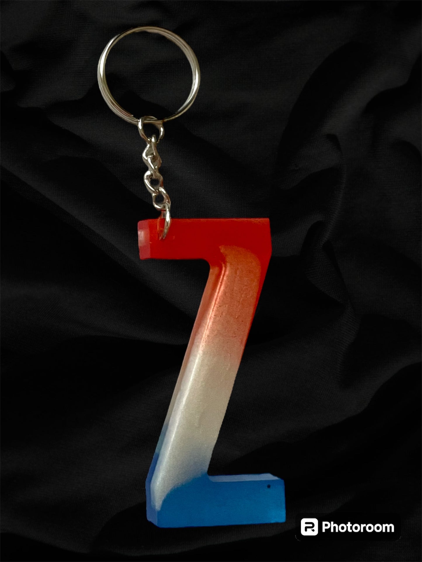 Resin / Epoxy Keychain Letter  - Hand poured and uniquely made. Size 2 1/2" x 1 1/2” Red, White & Blue Patriotic