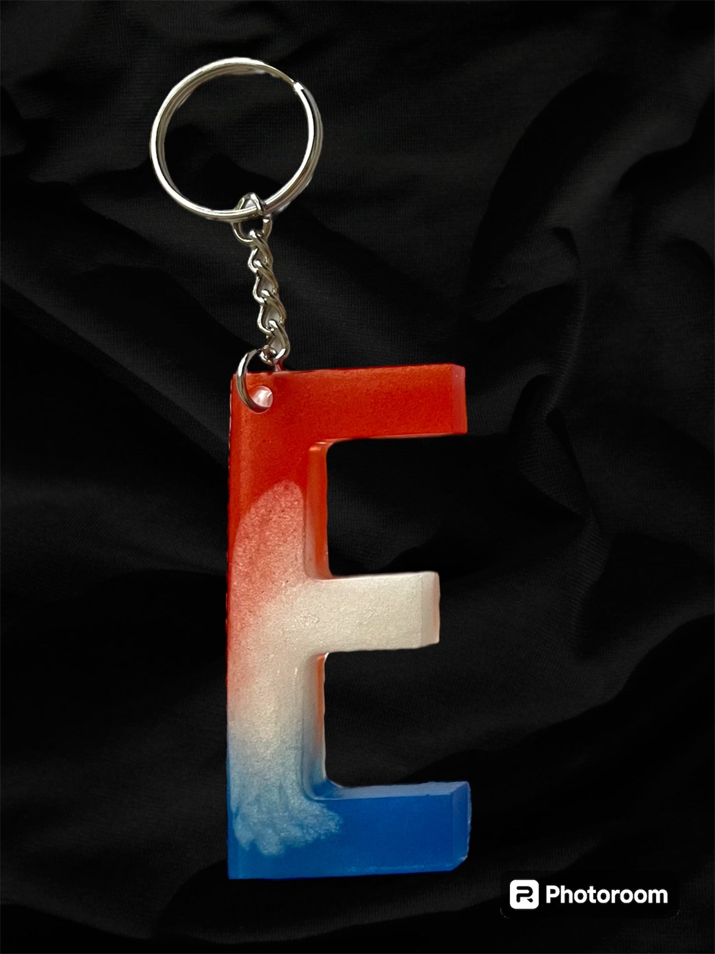 Resin / Epoxy Keychain Letter  - Hand poured and uniquely made. Size 2 1/2" x 1 1/2” Red, White & Blue Patriotic