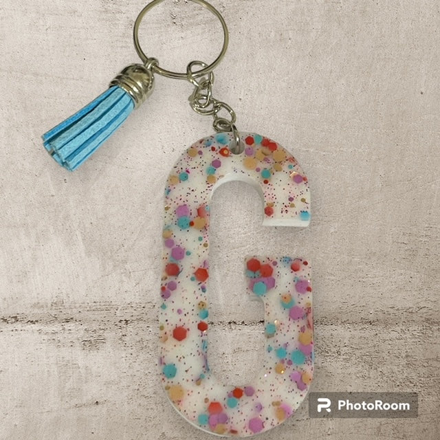 Resin / Epoxy Keychain Letter G - Hand poured and uniquely made. Size 2 1/2" x 1 1/2"