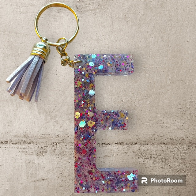 Resin / Epoxy Keychain Letter E - Hand poured and uniquely made. Size 2 1/2" x 1 1/2"