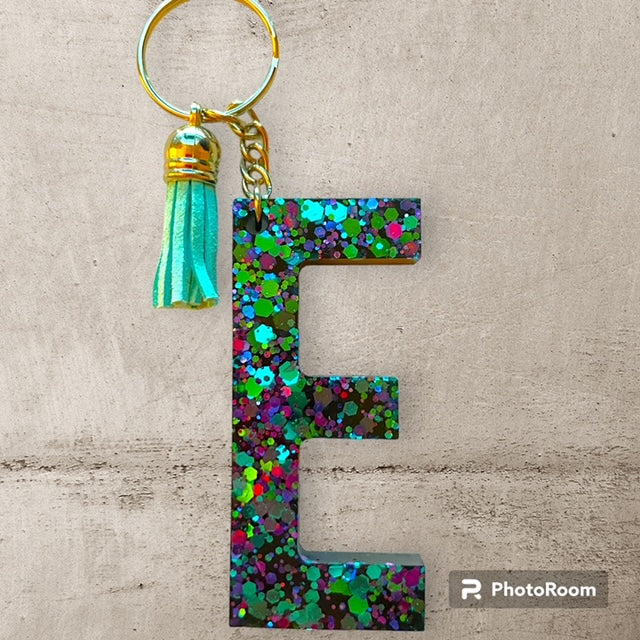 Resin / Epoxy Keychain Letter E - Hand poured and uniquely made. Size 2 1/2" x 1 1/2"