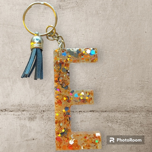 Resin / Epoxy Keychain Letter E - Hand poured and uniquely made. Size 2 1/2" x 1 1/2"