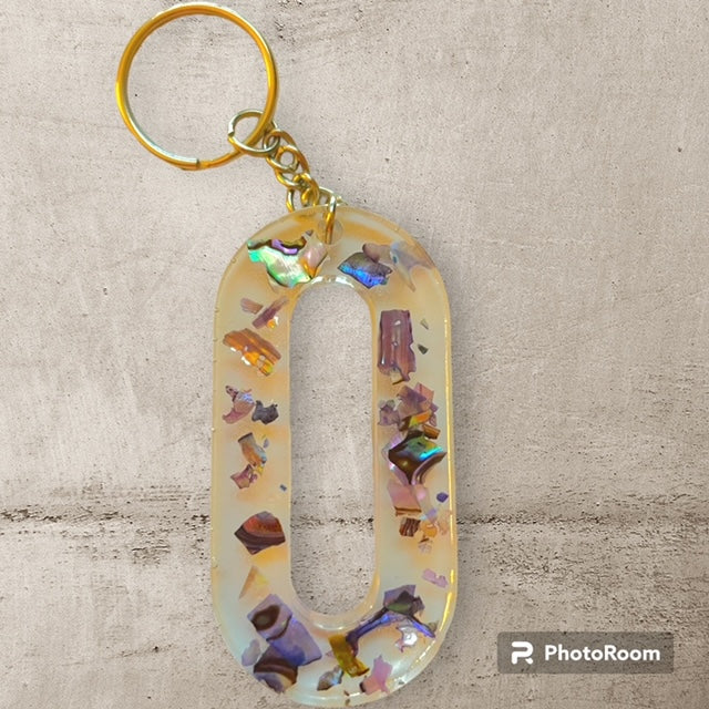 Resin / Epoxy Keychain Letter O - Hand poured and uniquely made. Size 2 1/2" x 1 1/2"