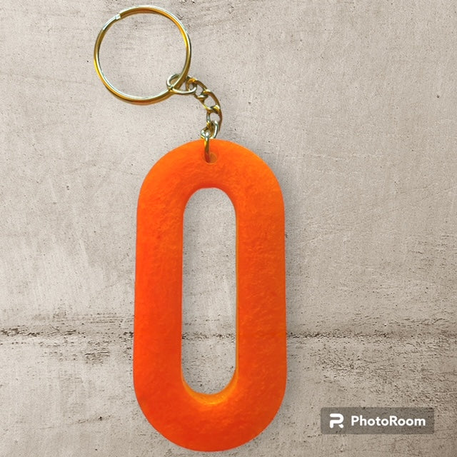 Resin / Epoxy Keychain Letter O - Hand poured and uniquely made. Size 2 1/2" x 1 1/2"