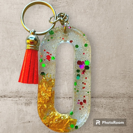 Resin / Epoxy Keychain Letter O - Hand poured and uniquely made. Size 2 1/2" x 1 1/2"