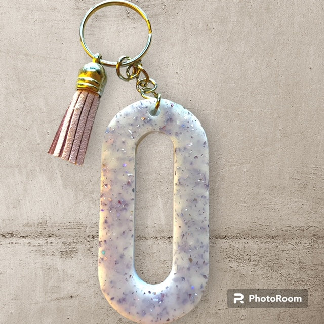 Resin / Epoxy Keychain Letter O - Hand poured and uniquely made. Size 2 1/2" x 1 1/2"