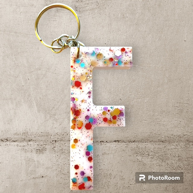 Resin / Epoxy Keychain Letter F - Hand poured and uniquely made. Size 2 1/2" x 1 1/2"