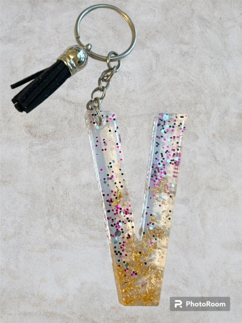 Resin / Epoxy Keychain Letter V - Hand poured and uniquely made. Size 2 1/2" x 1 1/2"