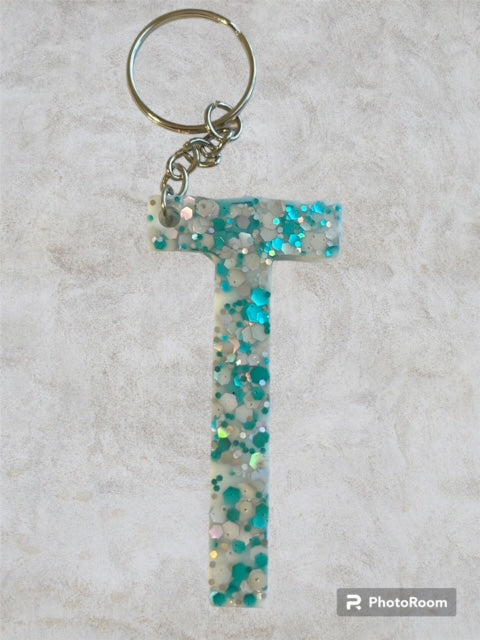 Resin / Epoxy Keychain Letter T - Hand poured and uniquely made. Size 2 1/2" x 1 1/2"