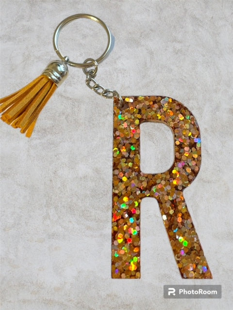 Resin / Epoxy Keychain Letter R - Hand poured and uniquely made. Size 2 1/2" x 1 1/2"