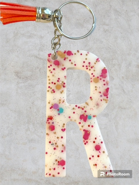 Resin / Epoxy Keychain Letter R - Hand poured and uniquely made. Size 2 1/2" x 1 1/2"